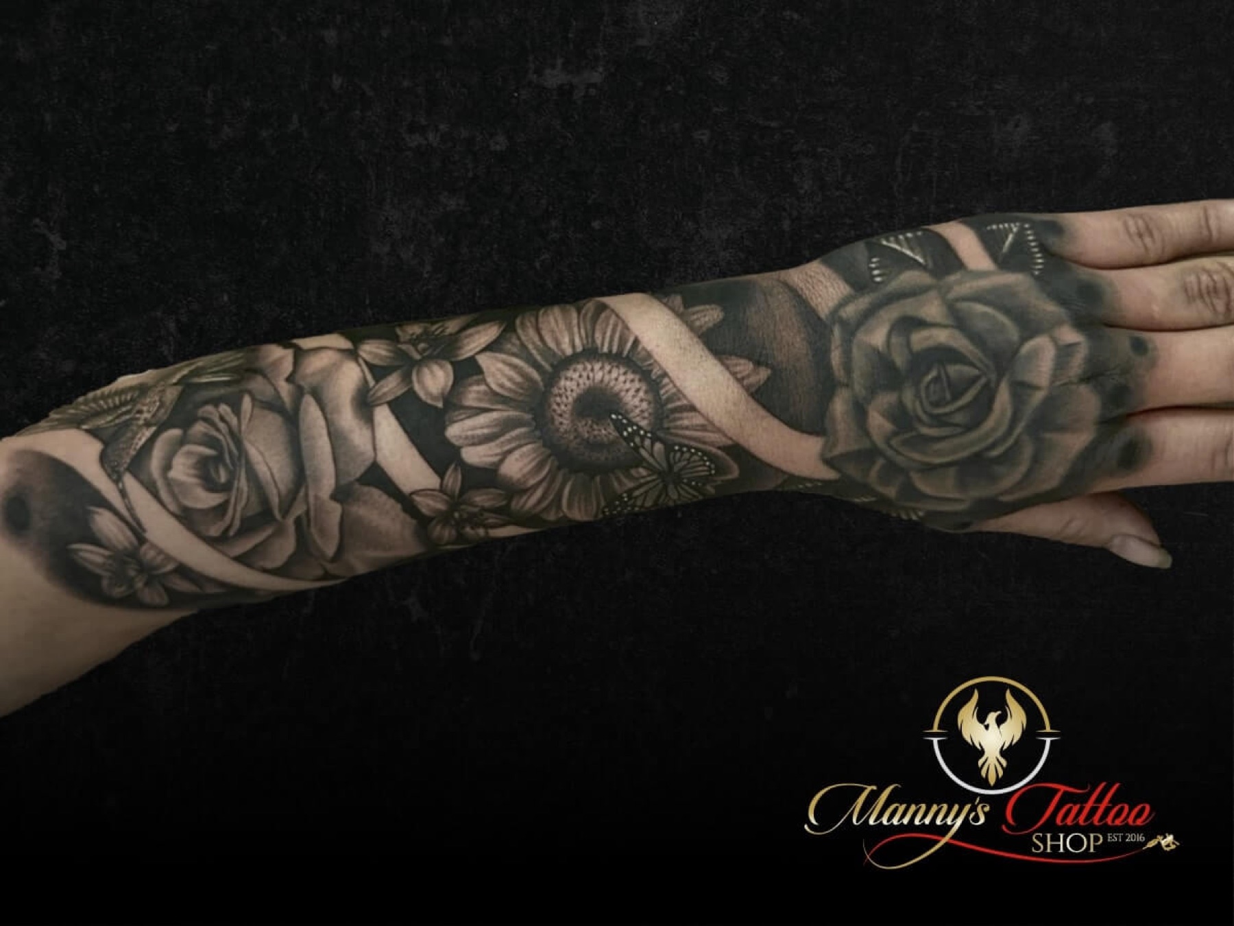 Black and gray floral tattoo from Manny’s official gallery